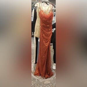 Elegant, floor length dress with criss cross backing. Great for fall/homecoming.